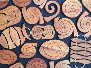 Handcrafted spiral tablemats and potstands of native New Zealand timbers